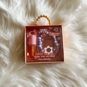 Brand new Unicat Juciy Lip Oil with Charms limited edition 💄